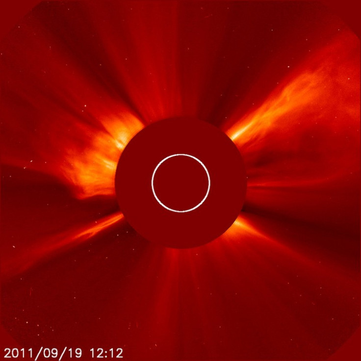 Solar flares continue to glance the Earth