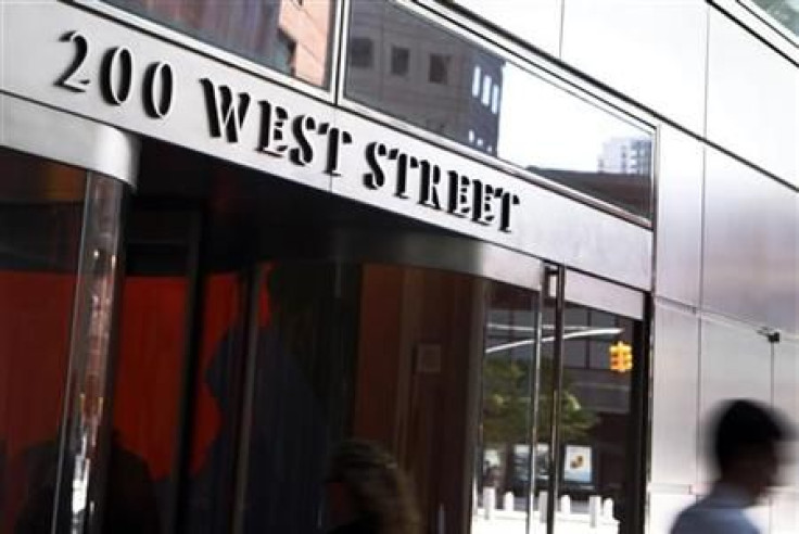 People walk past the entrance to the Goldman Sachs building at 200 West Street, New York