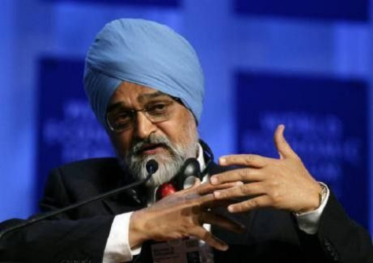 Montek Singh Ahluwalia, deputy chairman of India's planning commission, listens to a speaker in Davos, Switzerland, January 27, 2006. 