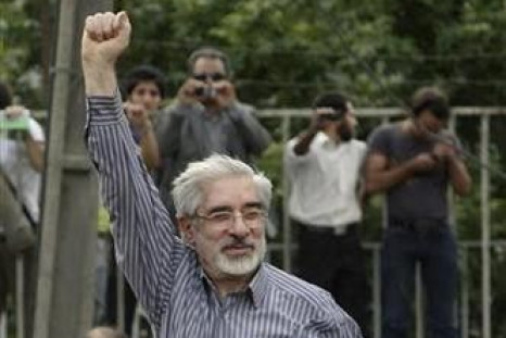 Defeated presidential candidate Mirhossein Mousavi attends a rally in support of him in Tehran