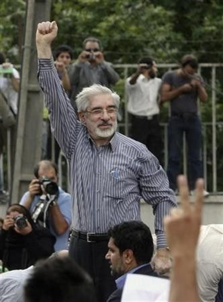 Defeated presidential candidate Mirhossein Mousavi attends a rally in support of him in Tehran
