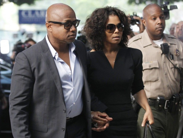 Janet Jackson arrives with her brother Randy during the opening day of Dr. Conrad Murray's trial in the death of pop star Michael Jackson in Los Angeles