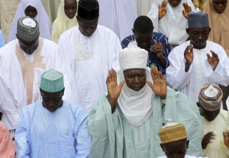 Muslims pray at the Kofar Mata central mosque to mark the end of the holy month of Ramadan in Nigeria's northern city of Kano.