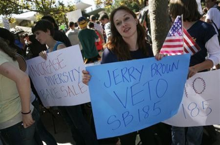 Students protest a bake sale on the campus of the University of California, Berkeley, in Berkeley, California