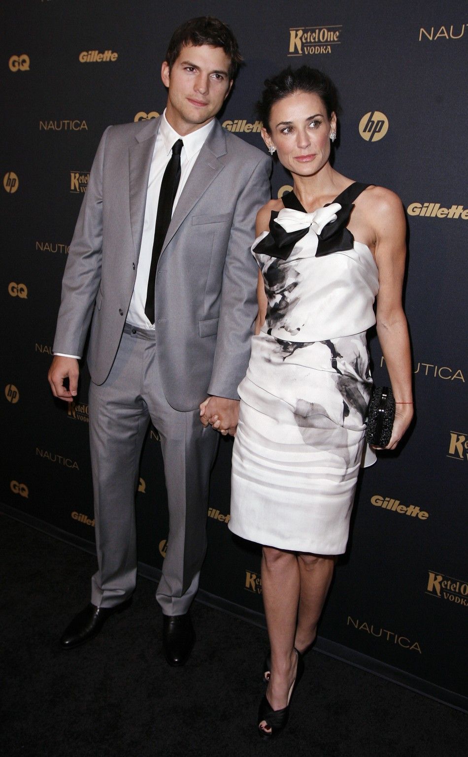 Actors Ashton Kutcher and Demi Moore arrive for GQ Magazines quotGentlemans Ballquot in New York