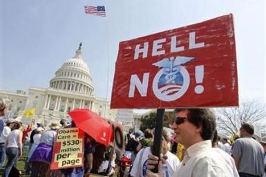 Opponents of the proposed U.S. health care bill are pictured during a rally outside the U.S. Capitol Building in Washington