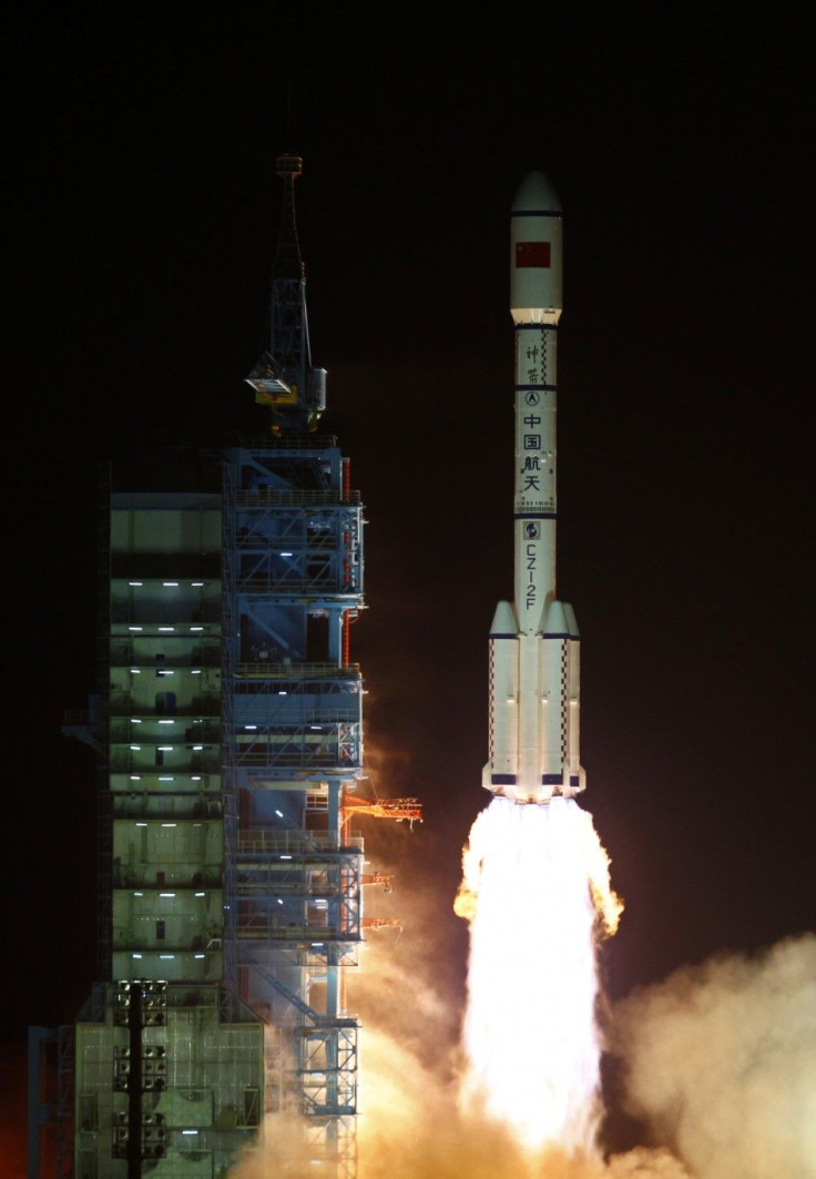 The Long March II-F rocket loaded with China's unmanned space module Tiangong-1 lifts off from the launch pad in the Jiuquan Satellite Launch Center, Gansu province