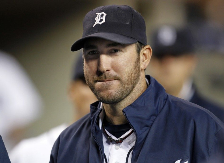 Tigers pitcher Verlander looks on in the dugout after the seventh inning against the Orioles in their MLB American League baseball game in Detroit
