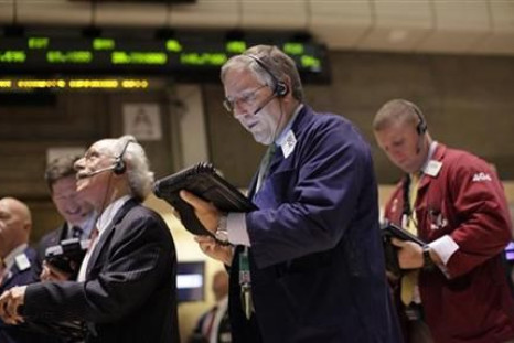 Traders work on the floor of the New York Stock Exchange