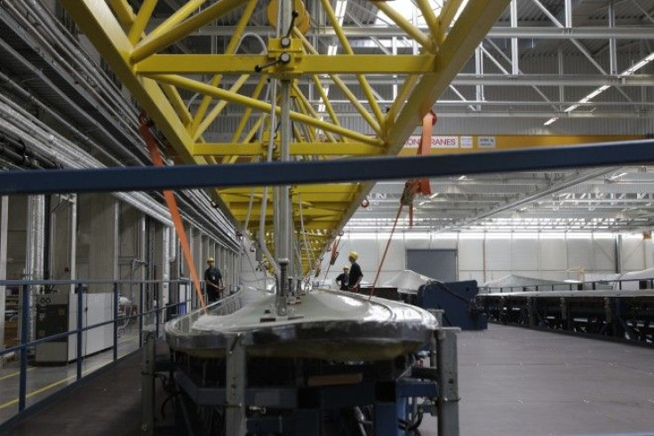 Engineers work at the Nordex wind turbine factory hall in Rostock