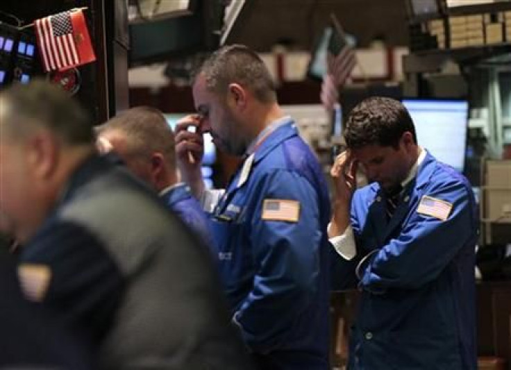 Traders work on the floor of the New York Stock Exchange