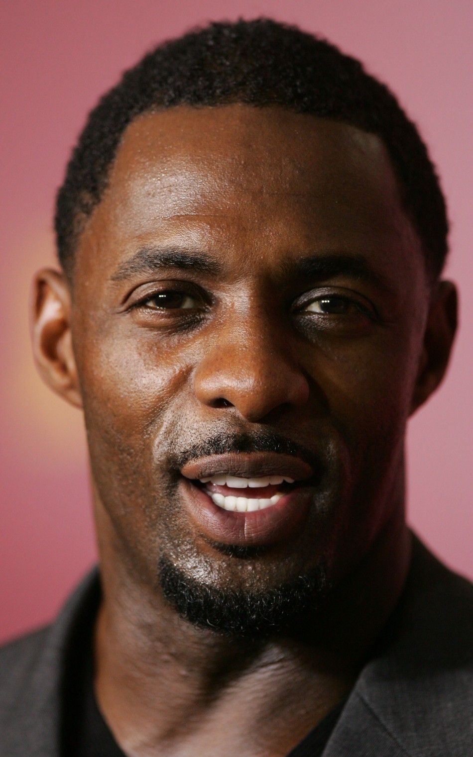 British actor Idris Elba poses during a photocall for the U.S.Rwanda film Sometimes in April by U.S. director Raoul Peck at the 55th Berlinale International Film Festival in Berlin February 17, 2005.