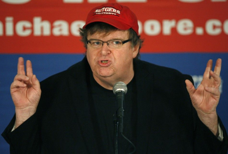 Michael Moore speaks at a news conference in Washington