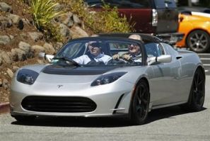 Prince Consort Henrik of Denmark tests drive a Tesla electric Roadster during his visit to the Tesla headquarters in Palo Alto