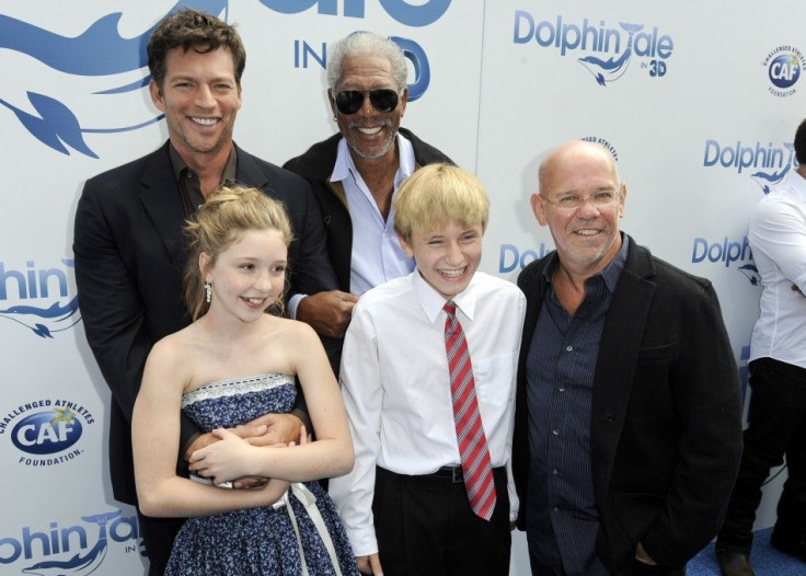 Cast members and director arrive at the movie &quot;Dolphin Tale&quot; world premiere in Los Angeles, California