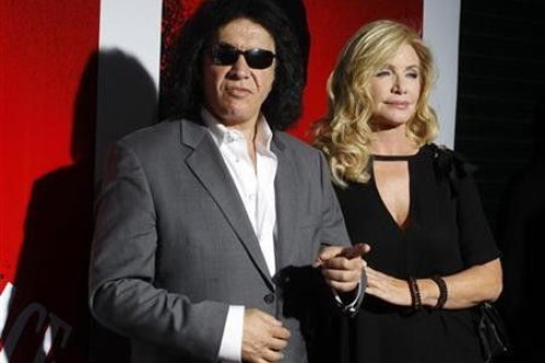 Gene Simmons of the band Kiss and actress Shannon Tweed arrive at the Blu-ray disc launch party for the 1983 classic film ''Scarface'' in Los Angeles, California