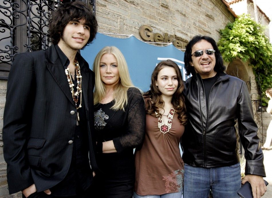 Music recording artist Gene Simmons R poses with his long time partner Shannon Tweed 2nd-L and their two children, Nicholas and Sophie, at the AE networks up-front presentation at the Geffen Playhouse in Los Angeles 