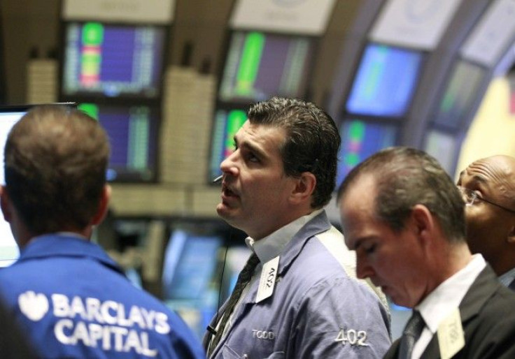 Traders work on the floor of the New York Stock Exchange