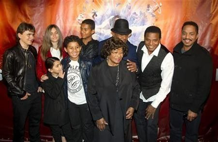 The family of late singer Michael Jackson, including his children Prince Michael Joseph Jackson Jr. (far L) , Paris-Michael Katherine Jackson (2nd L) and Prince Michael Jackson II (L front), his brother's children Jaffar Jackson (3rd L back), Jermaje