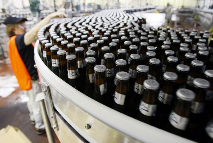 Thousands of newly-labelled bottles of Coors Light beer head for packaging at the Coors brewery in Golden, Colorado