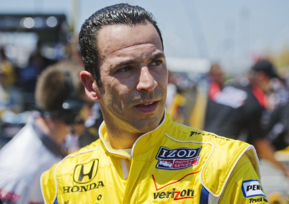 Team Penskes Helio Castroneves of Brazil looks on after practice sessions at the Honda Indy Toronto in Toronto