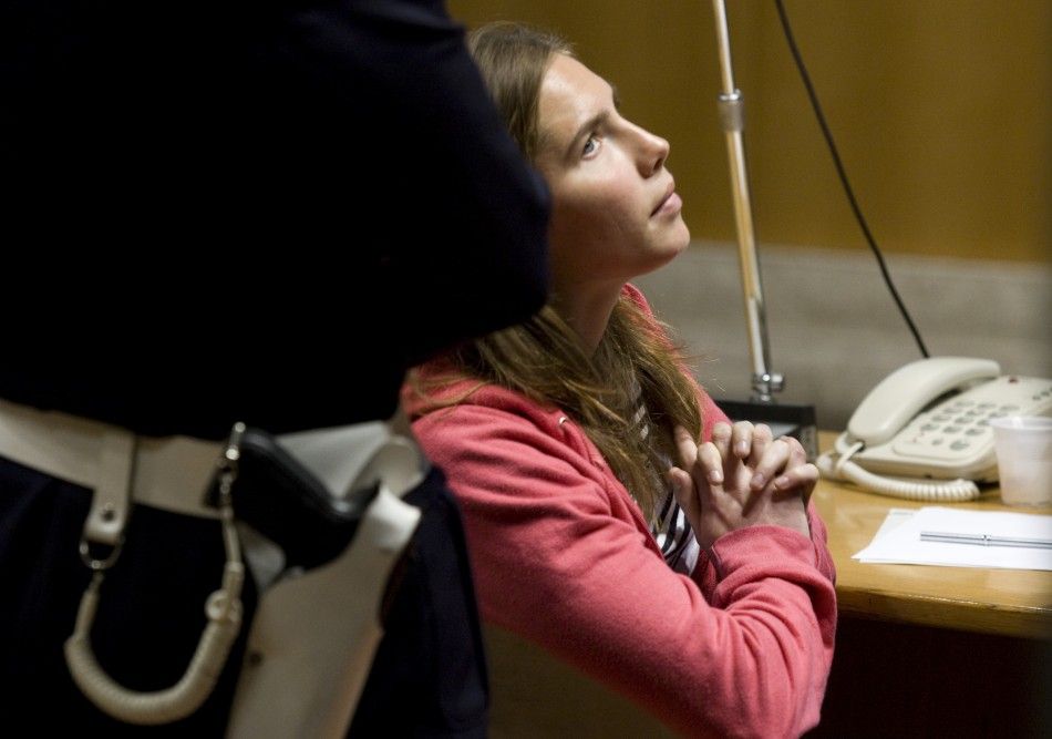 Jailed suspect Amanda Knox sits in the courtroom during a break in her murder trial session in Perugia 