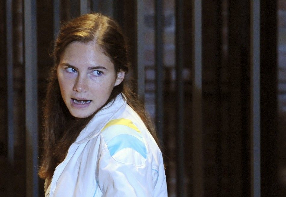 Amanda Knox reacts in the courtroom during a murder trial session in Perugia 