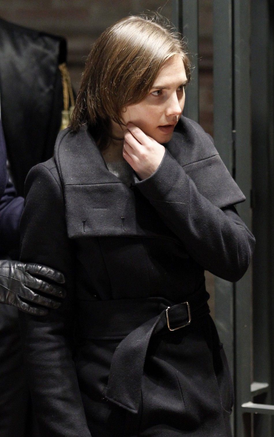Amanda Knox, the U.S. student convicted of killing her British flatmate in Italy three years ago, returns to the courtroom after a break during a trial session in Perugia