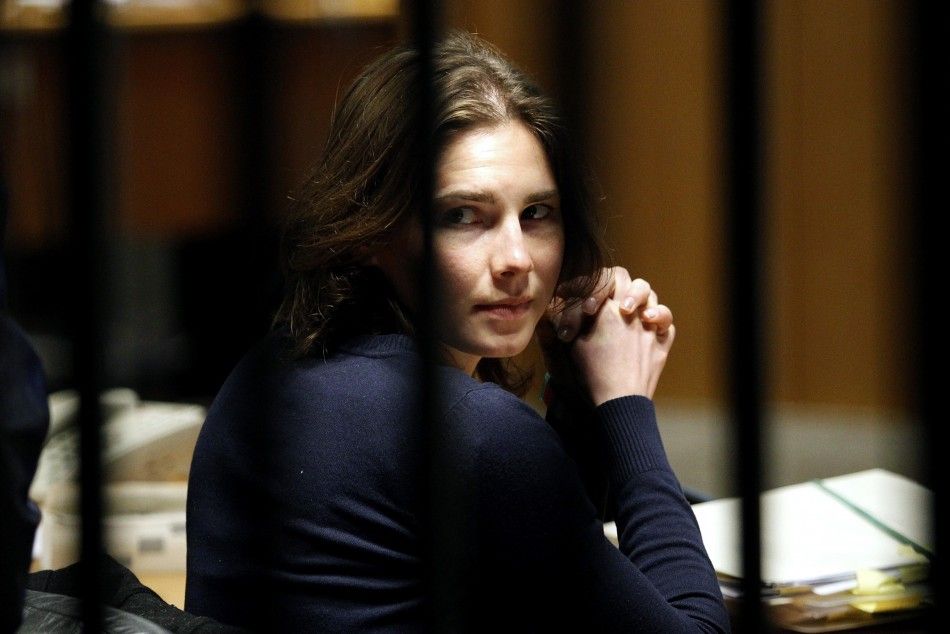 Amanda Knox, the U.S. student convicted of killing her British flatmate in Italy three years ago, sits in the courtroom after a break during a trial session in Perugia