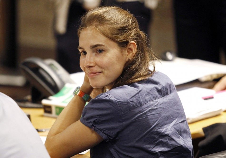 Amanda Knox, the U.S. student convicted of killing her British flatmate Meredith Kercher in Italy on November 2007, smiles during a break at her appeal trial session in Perugia 