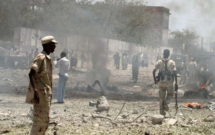 Somalia government soldiers secure the scene of a suicide attack in Somalia&#039;s capital Mogadishu