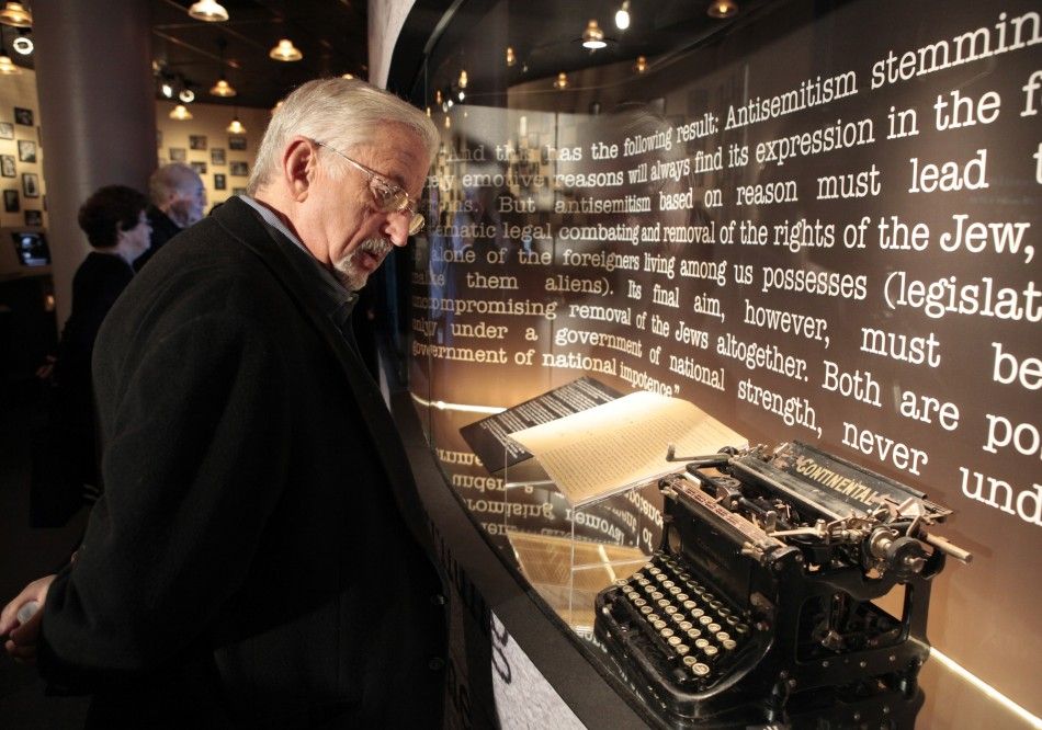 Holocaust survivor Dr Jack Wetter, 68, views a copy of the Gemlich Letter, which was written by Adolf Hitler in 1919 and unveiled for public display at the Museum of Tolerance in Los Angeles, California 