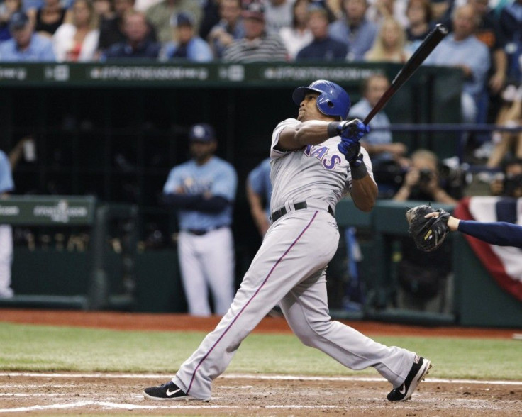 Rangers&#039; Adrian Beltre watches his third home run of the game in the seventh inning of play against the Rays in Game 4 in their MLB playoffs in St. Petersburg