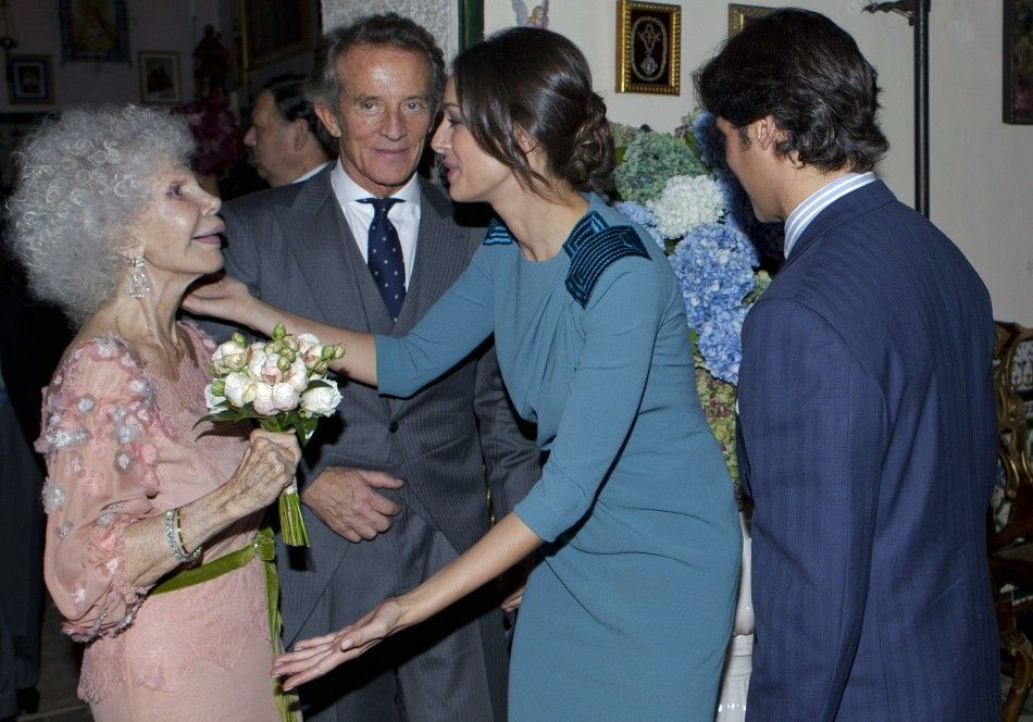Spains Duchess of Alba Cayetana Fitz-James Stuart y Silva and her husband Alfonso Diez are congratulated by Cayetano Rivera and Eva Gonzalez after their wedding ceremony in Seville
