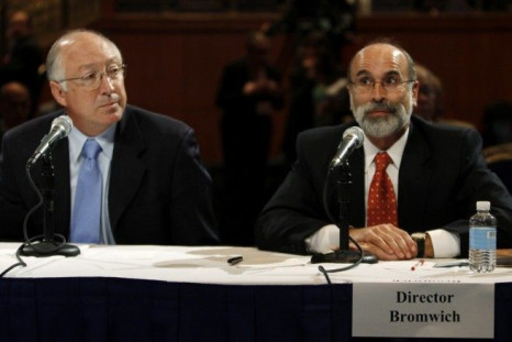 Michael Bromwich, Director, Bureau of Ocean Energy Management, Regulation, and Enforcement testifies as U.S. Secretary of the Interior Ken Salazar (L) watches during the &quot;Future of Offshore Drilling&quot; panel at the National Commission on the BP De