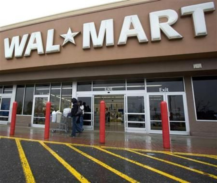 Shoppers cart their purchases from a Wal-Mart store in Alexandria, Virginia