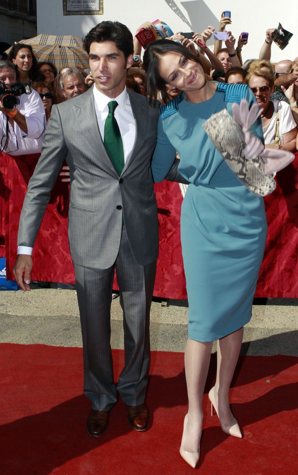 Spanish bullfighter Cayetano Rivera L and his girlfriend Eva Gonzalez arrive at Las Duenas Palace to attend the wedding of Spains Duchess of Alba Cayetana Fitz-James Stuart y Silva and Alfonso Diez in Seville