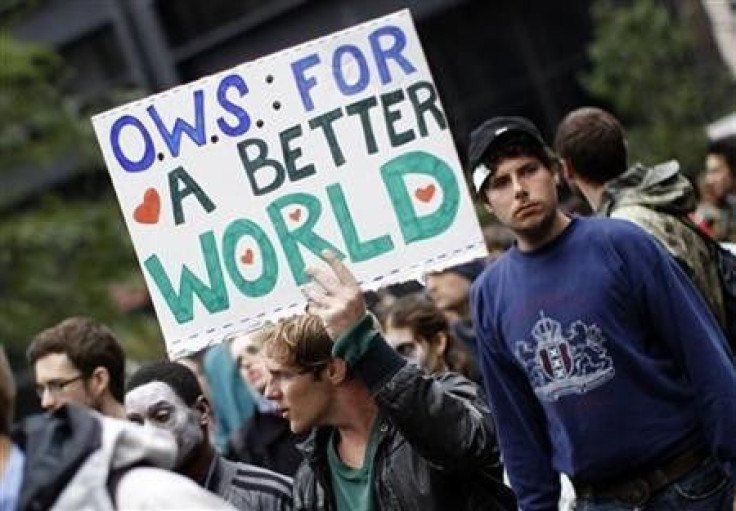 A demonstrator holds a sign during an Occupy Wall Street protest in lower Manhattan in New York