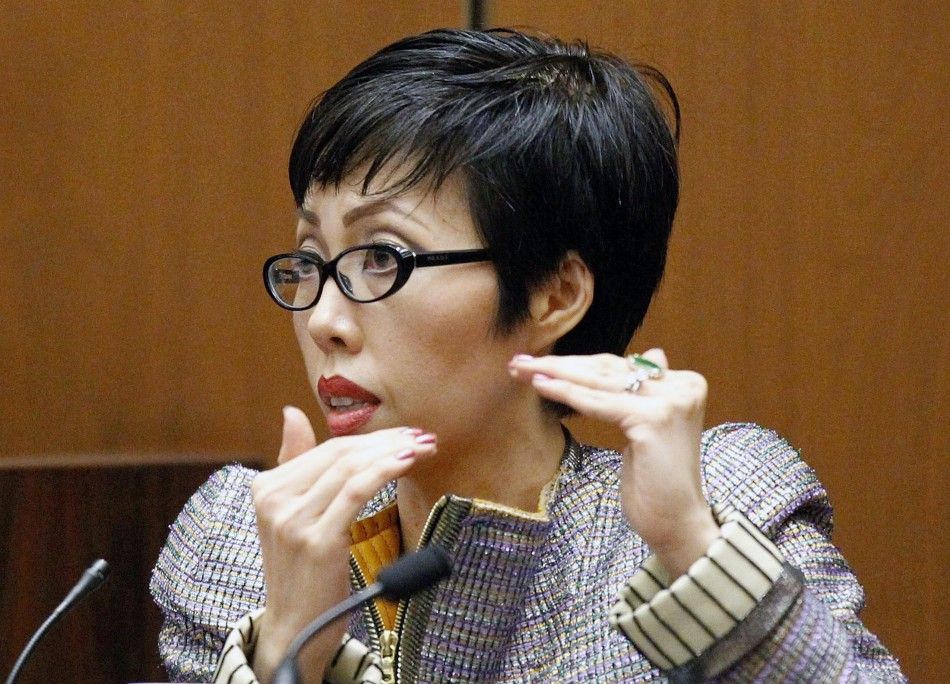 Cardiologist Dr. Thao Nguyen gestures as she testifies during Dr. Conrad Murrays trial in the death of pop star Michael Jackson in Los Angeles