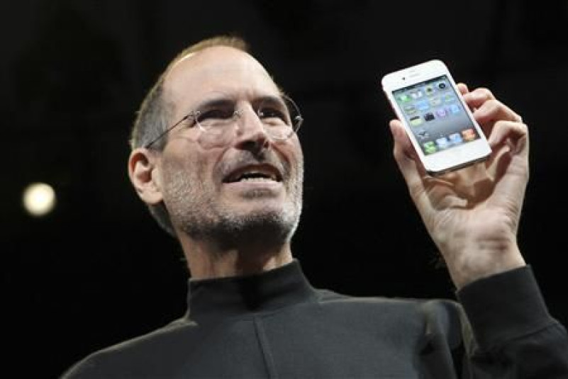File photo of Apple CEO Steve Jobs posing with the new iPhone 4 during the Apple Worldwide Developers Conference in San Francisco, California