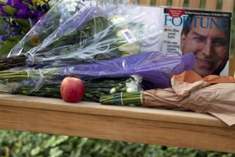A memorial outside Apple headquarters is set on a bench following the death of Apple Inc founder Steve Jobs in Cupertino, California