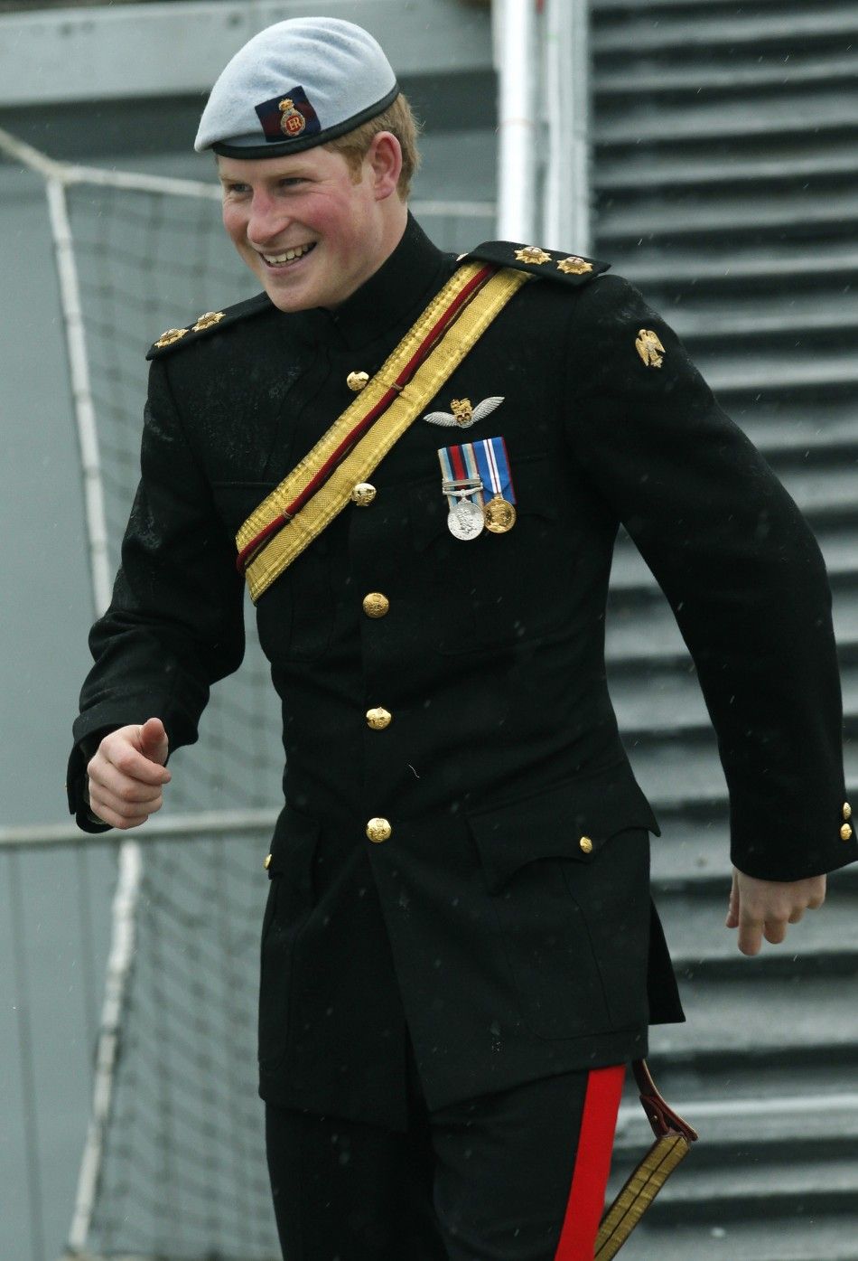 Britains Prince Harry, disembarks from HMS Cattistock during a visit to Portsmouth Naval Base, in Portsmouth