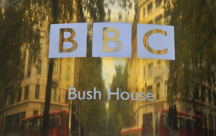 Buildings are reflected in a sign at British Broadcasting Corporation offices in central London