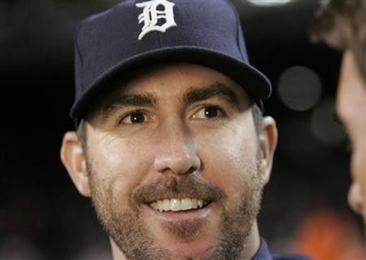 Detroit Tigers starting pitcher Justin Verlander smiles after the Tigers defeated the New York Yankees in Game 3 in their MLB American League Division Series baseball playoffs in Detroit