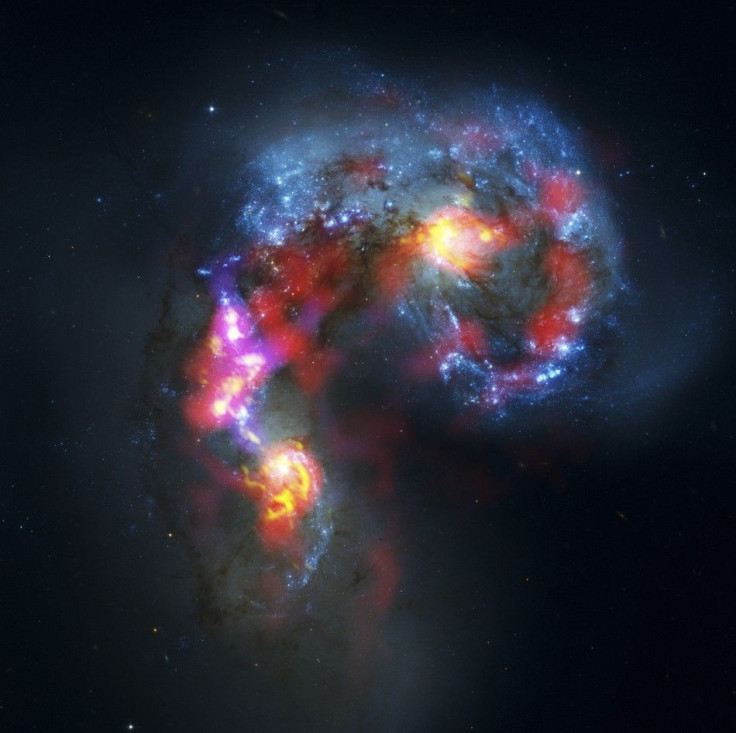The Antennae Galaxies are seen in this image made from the parabolic antennas of the ALMA