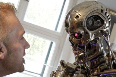 A visitor looks at robot figure inside the house where Austrian actor and former California governor Schwarzenegger was born in Thal
