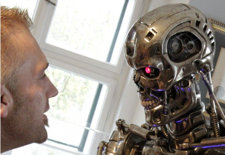 A visitor looks at robot figure inside the house where Austrian actor and former California governor Schwarzenegger was born in Thal