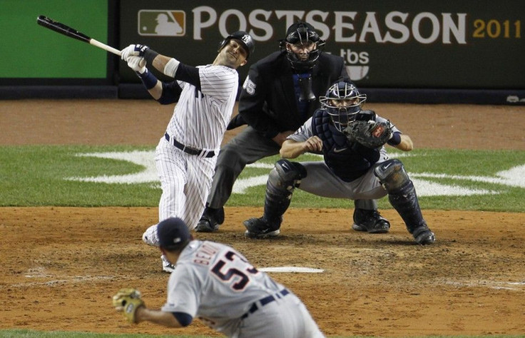 New York Yankees&#039; Nick Swisher strikes out with the bases loaded in the seventh inning of play against the Detroit Tigers in Game 5 of their MLB American League Division Series baseball playoffs at Yankee Stadium in New York