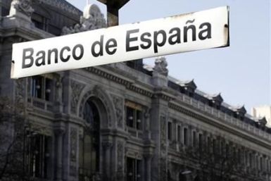 The Bank of Spain is seen behind a sign in Madrid
