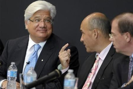 Research In Motion Co-CEOs Balsillie and Lazaridis talk during the annual general meeting of shareholders in Waterloo